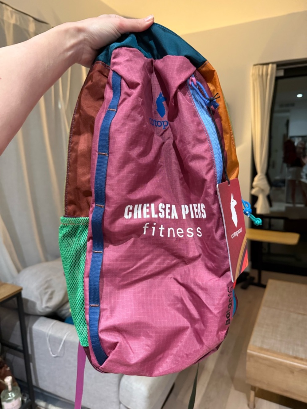 cotopaxi Multicolor Drawstring Daypack in Pink, Teal, Green, Orange